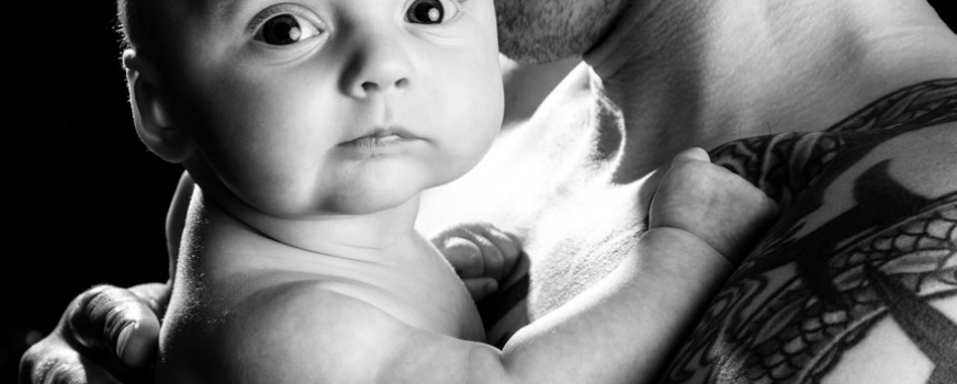 Dad with Newborn in Studio